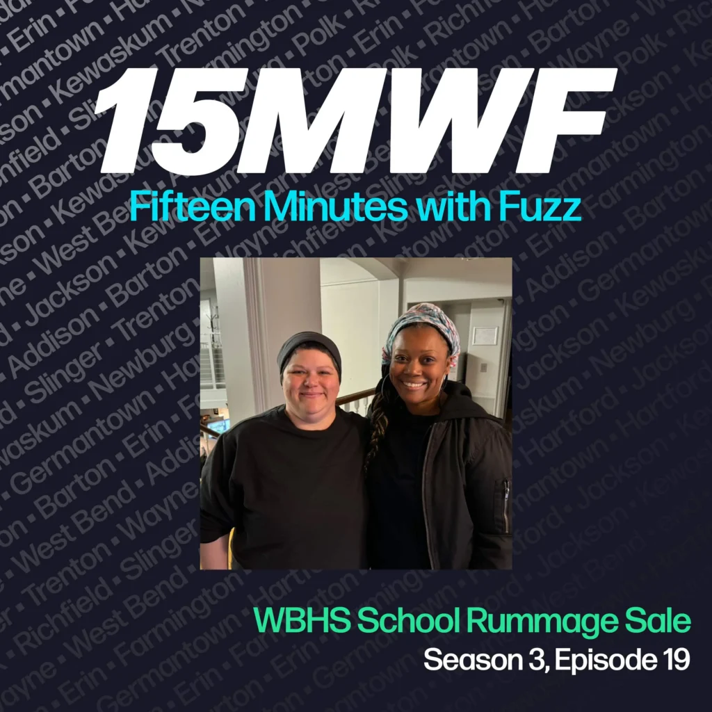 15MWF - Fifteen Minutes with Fuzz podcast cover art for Season 3, Episode 19 featuring the WBHS School Rummage Sale. The background includes names of various locations within Washington County, emphasizing the local focus of the podcast. Two people are smiling at the camera, both dressed casually in dark clothing.