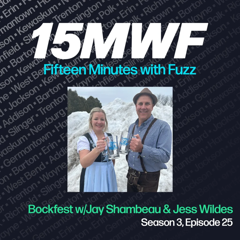 15MWF - Fifteen Minutes with Fuzz podcast cover art for Season 3, Episode 25 featuring Bockfest with Jay Shambeau and Jess Wildes. The background includes names of various locations within Washington County, emphasizing the local focus of the podcast. A photo of Jay Shambeau and Jess Wildes, dressed in traditional German attire and holding beer steins, is placed in the center.