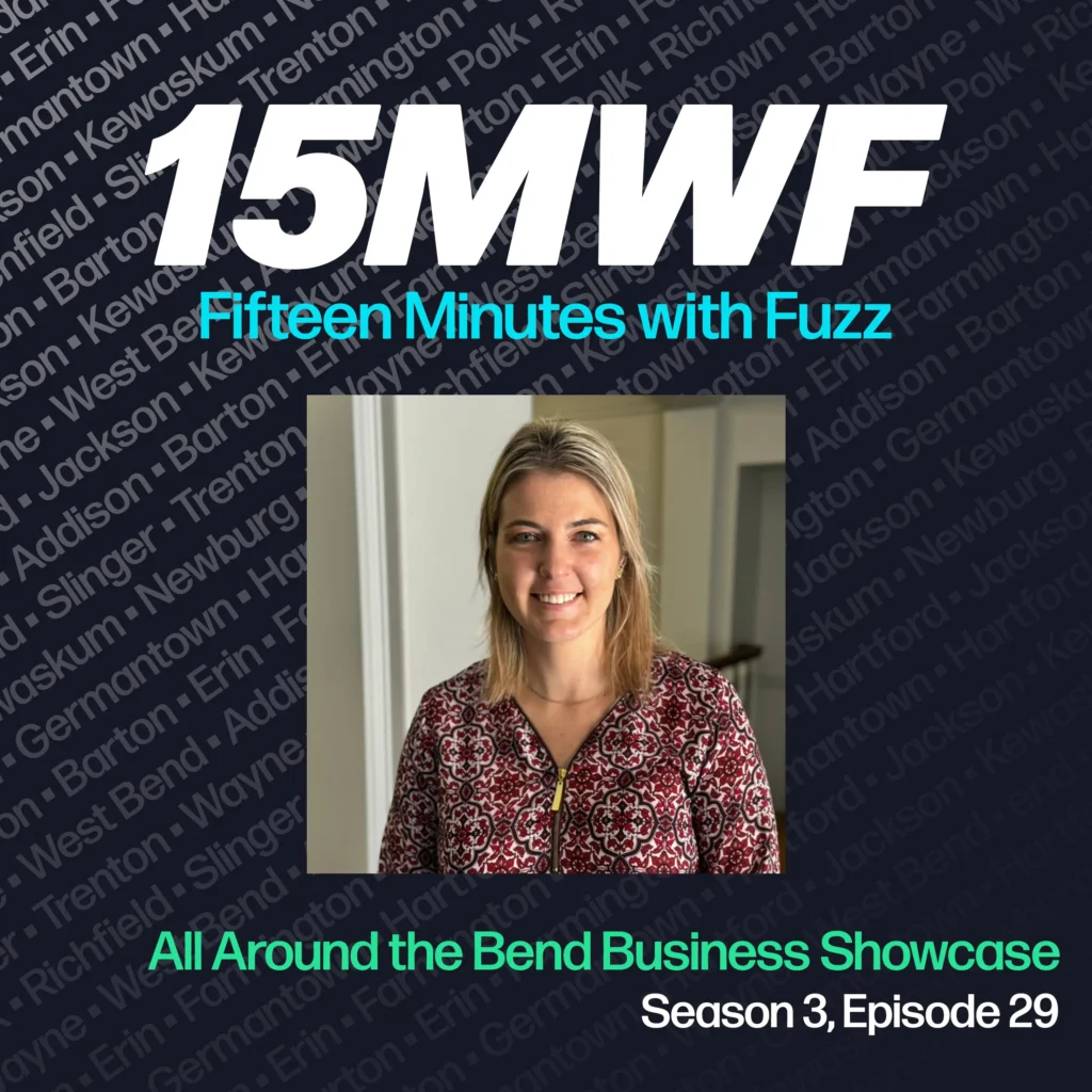 15MWF - Fifteen Minutes with Fuzz podcast cover art for Season 3, Episode 29 titled ‘All Around the Bend Business Showcase.’ The background includes names of various locations within Washington County, emphasizing the local focus of the podcast. A photo of Amber Cypcar, smiling and wearing a patterned blouse, is placed in the center.