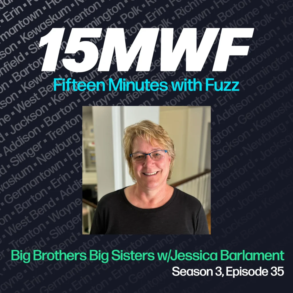 15MWF - Fifteen Minutes with Fuzz podcast cover art for Season 3, Episode 35 titled ‘Big Brothers Big Sisters with Jessica Barlament.’ The background includes names of various locations within Washington County, emphasizing the local focus of the podcast. A photo of Jessica Barlament, smiling and wearing glasses and a black top, is placed in the center.