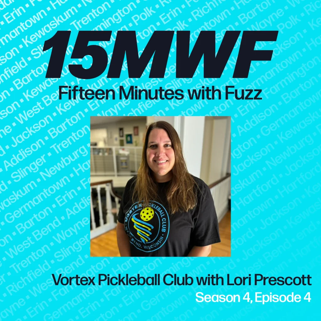 Promotional graphic for the podcast ‘Fifteen Minutes with Fuzz,’ featuring Lori Prescott of the Vortex Pickleball Club. The text reads: ‘15MWF, Fifteen Minutes with Fuzz, Vortex Pickleball Club with Lori Prescott, Season 4, Episode 4.’ The image includes a photo of Lori Prescott wearing a Vortex Pickleball Club t-shirt, standing in an indoor setting. The background has a teal color with names of local towns in a lighter shade.
