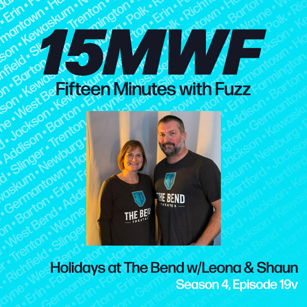A square promotional graphic for “Fifteen Minutes with Fuzz,” featuring a new episode titled “Holidays at The Bend w/Leona & Shaun.” The background is turquoise with text listing local community names in lighter text. The title “15MWF” appears in bold black text at the top, followed by “Fifteen Minutes with Fuzz.” Below is a photo of Leona Knobloch and Shaun Tanner wearing “The Bend Theater” branded shirts. Episode information is displayed as “Season 4, Episode 19.”